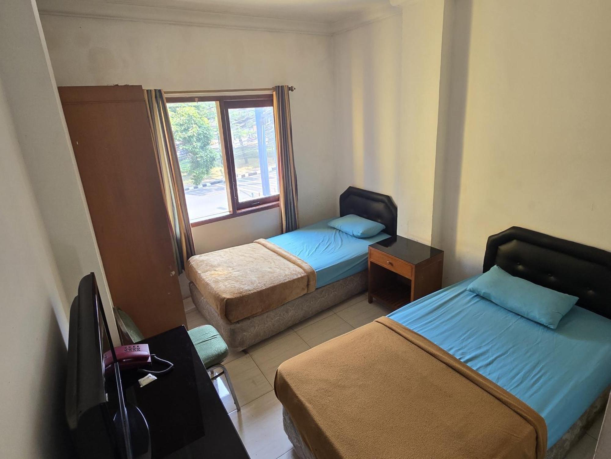Hotel Maxim Kwitang Τζακάρτα Δωμάτιο φωτογραφία