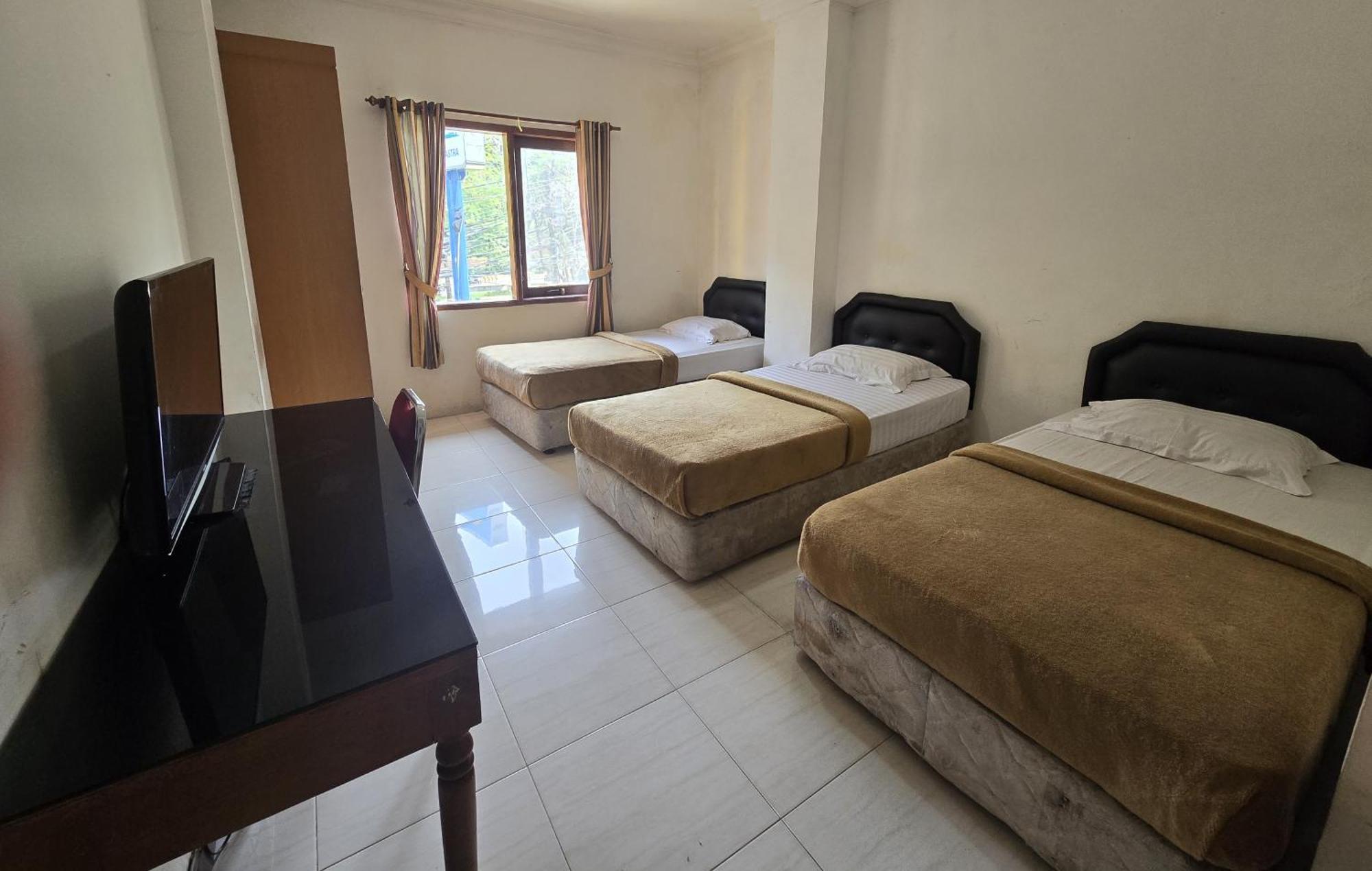 Hotel Maxim Kwitang Τζακάρτα Δωμάτιο φωτογραφία