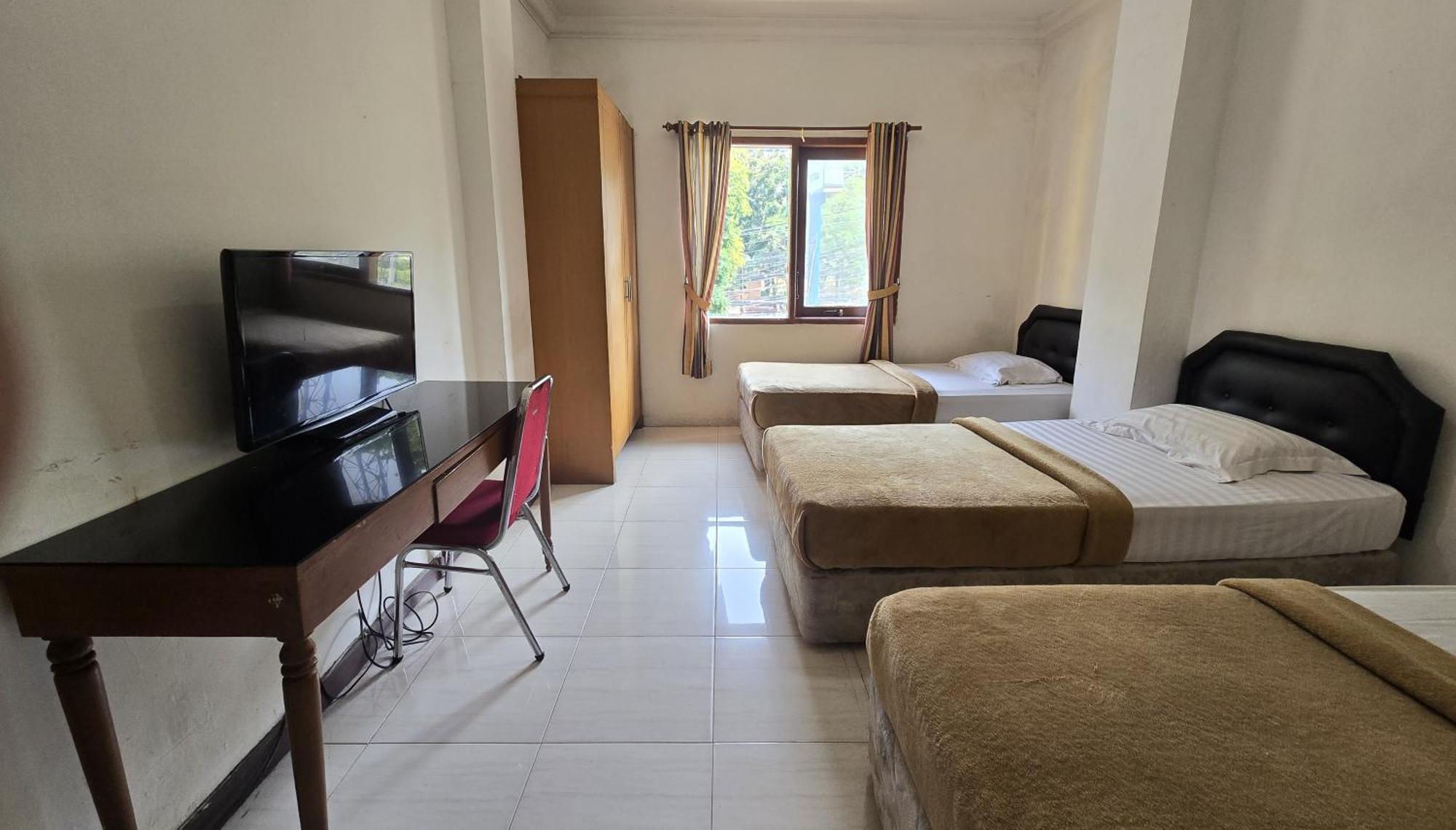 Hotel Maxim Kwitang Τζακάρτα Δωμάτιο φωτογραφία