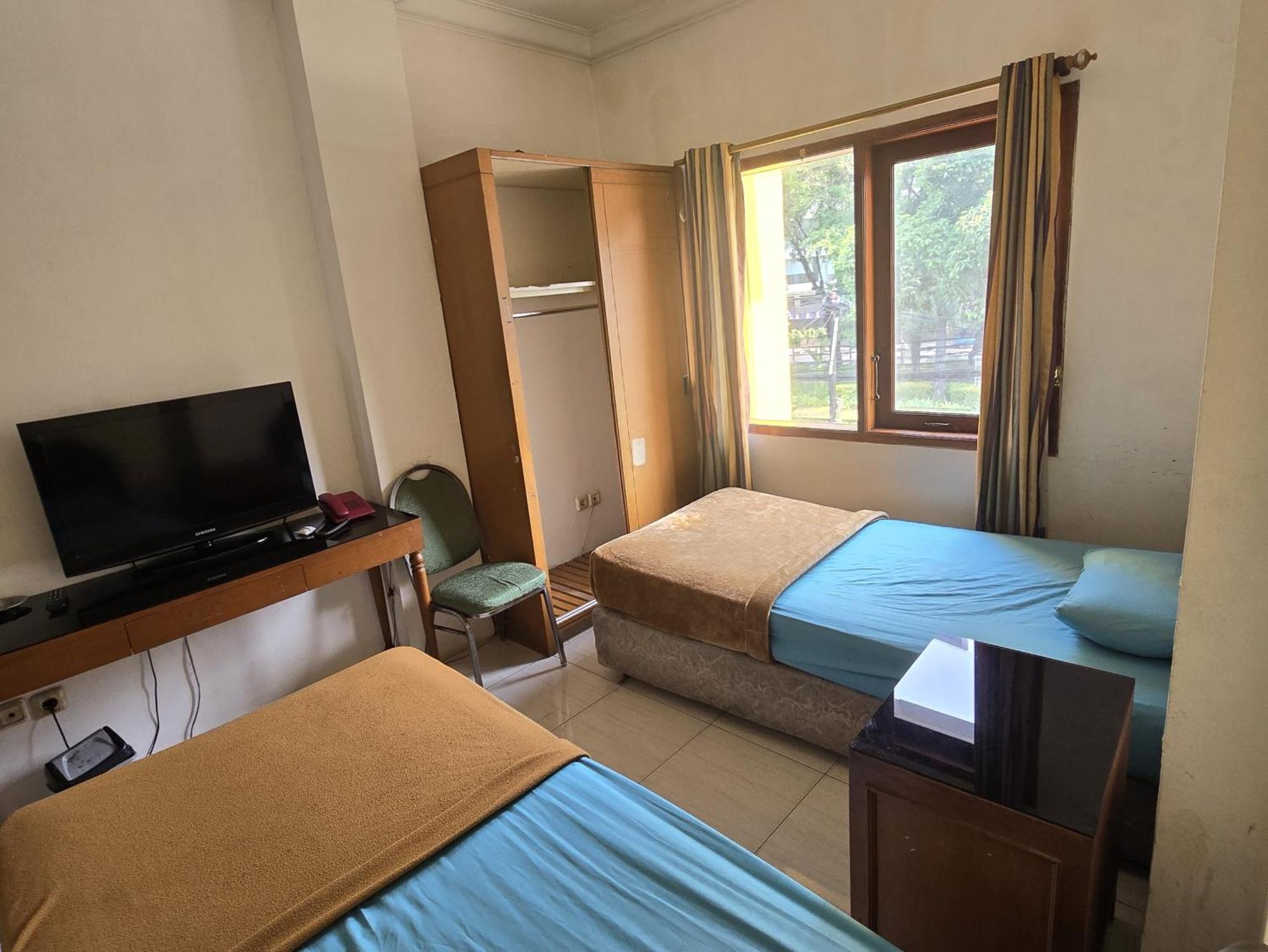 Hotel Maxim Kwitang Τζακάρτα Δωμάτιο φωτογραφία