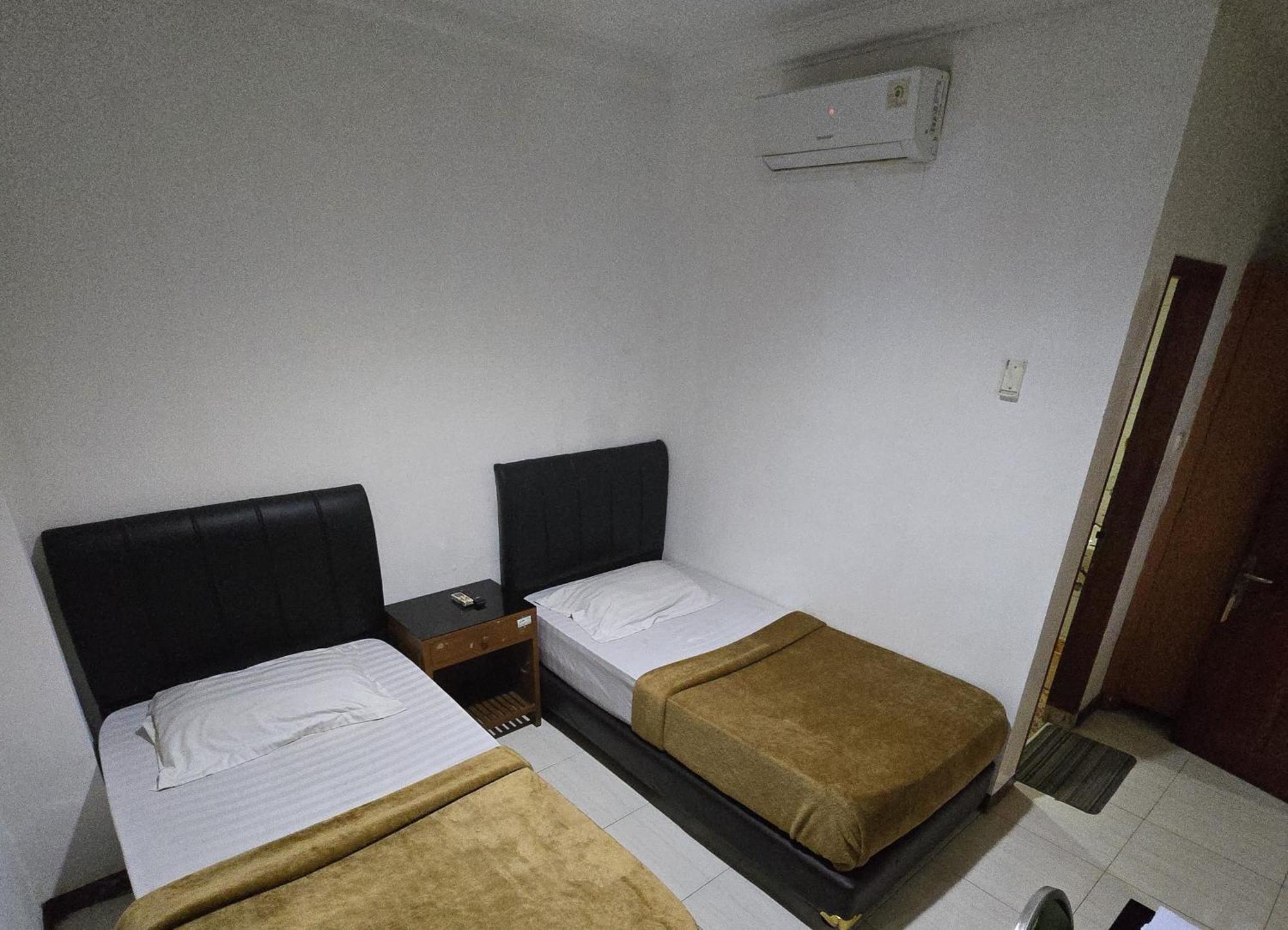Hotel Maxim Kwitang Τζακάρτα Δωμάτιο φωτογραφία