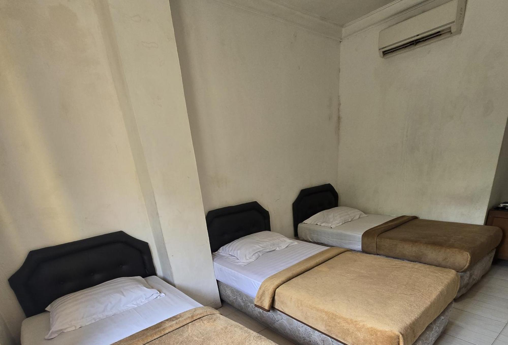 Hotel Maxim Kwitang Τζακάρτα Δωμάτιο φωτογραφία