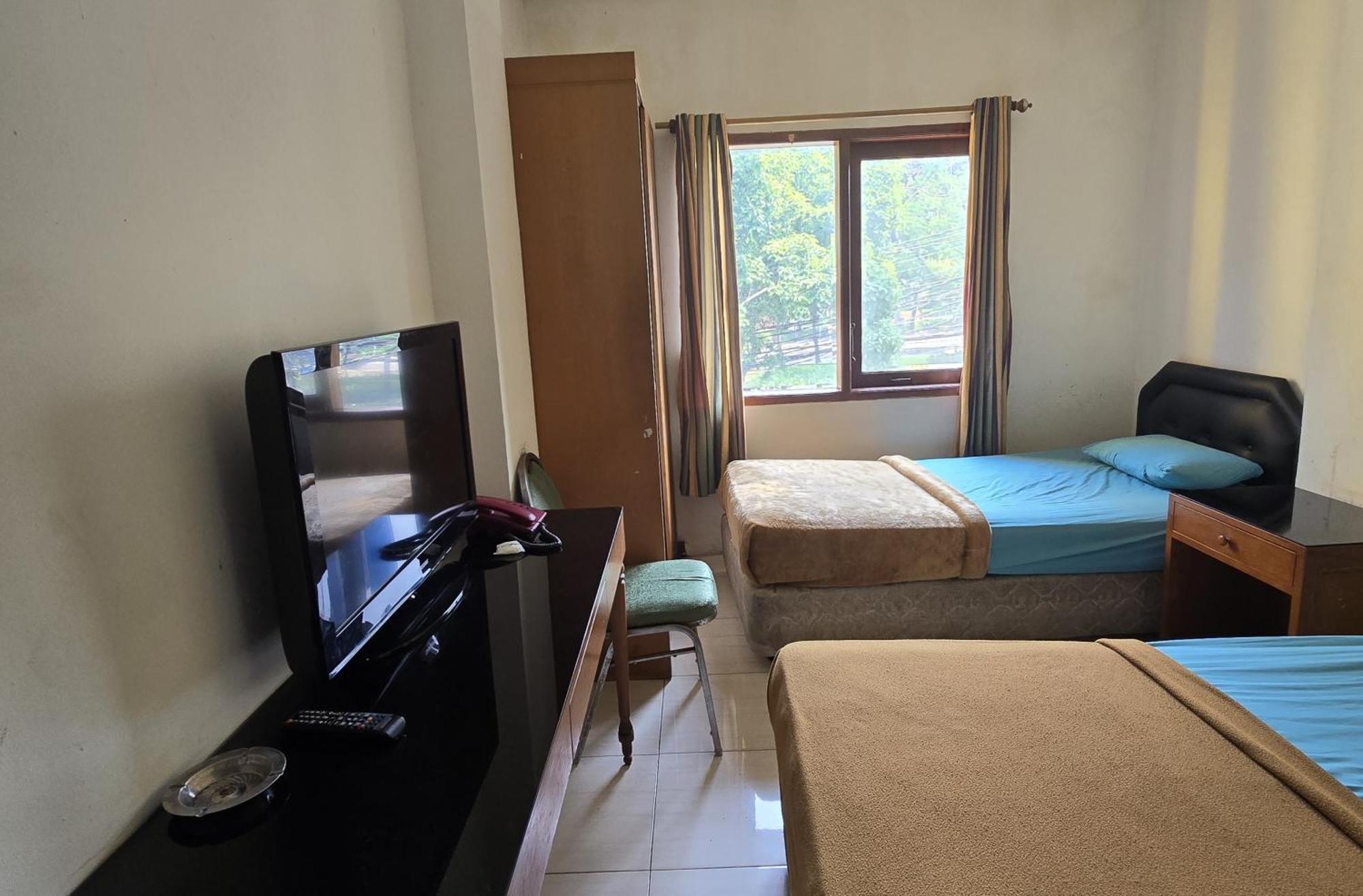 Hotel Maxim Kwitang Τζακάρτα Δωμάτιο φωτογραφία