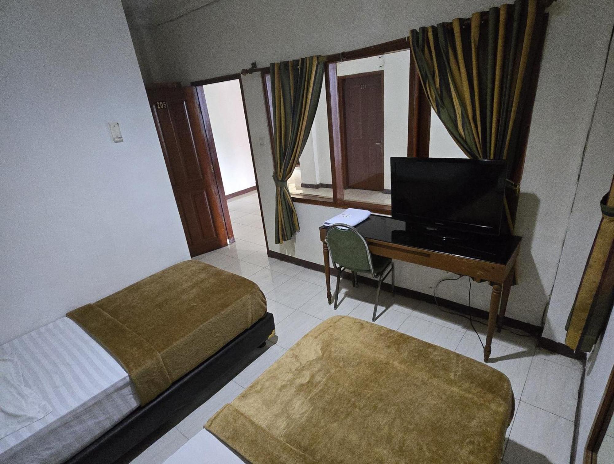 Hotel Maxim Kwitang Τζακάρτα Δωμάτιο φωτογραφία